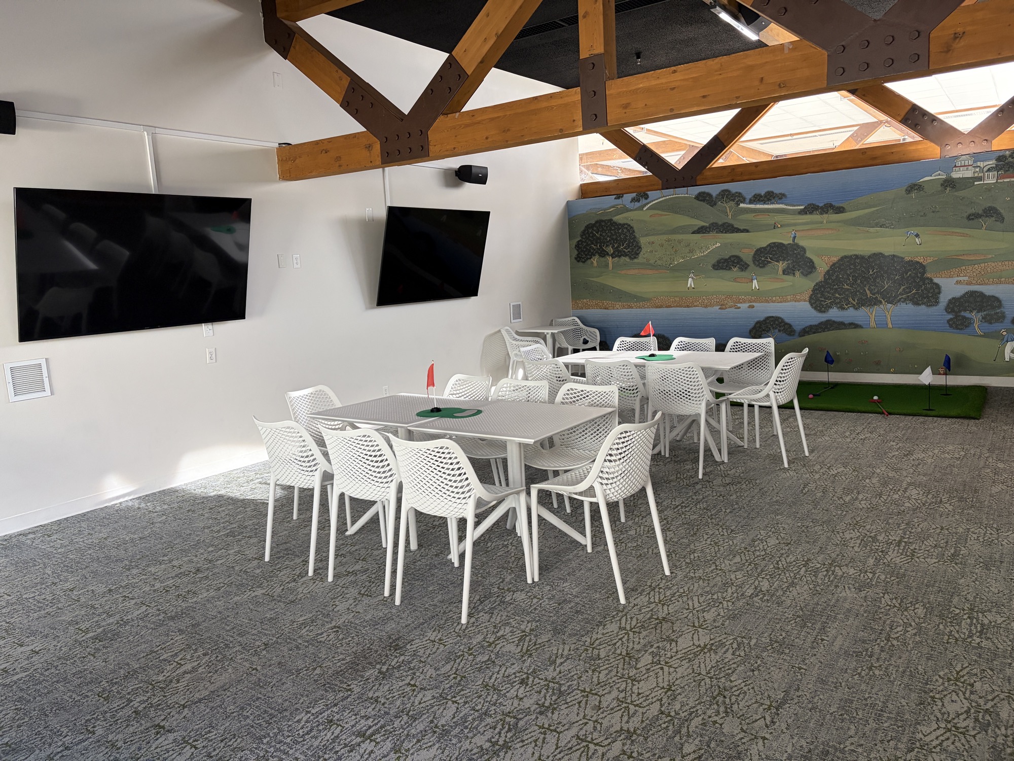 The party room, set up with tables and chairs